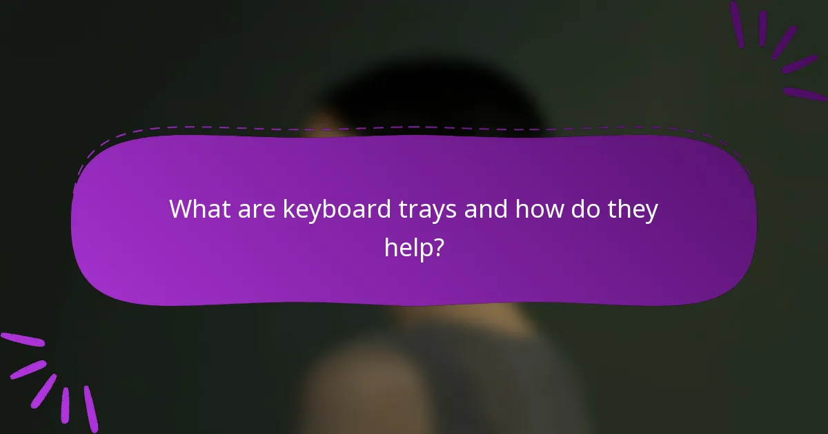 What are keyboard trays and how do they help?